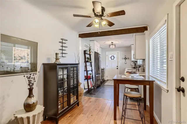 a view of dining room with furniture and window