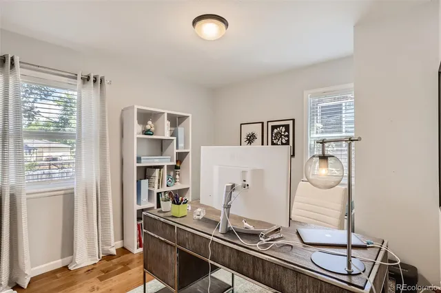 a room with furniture and a window