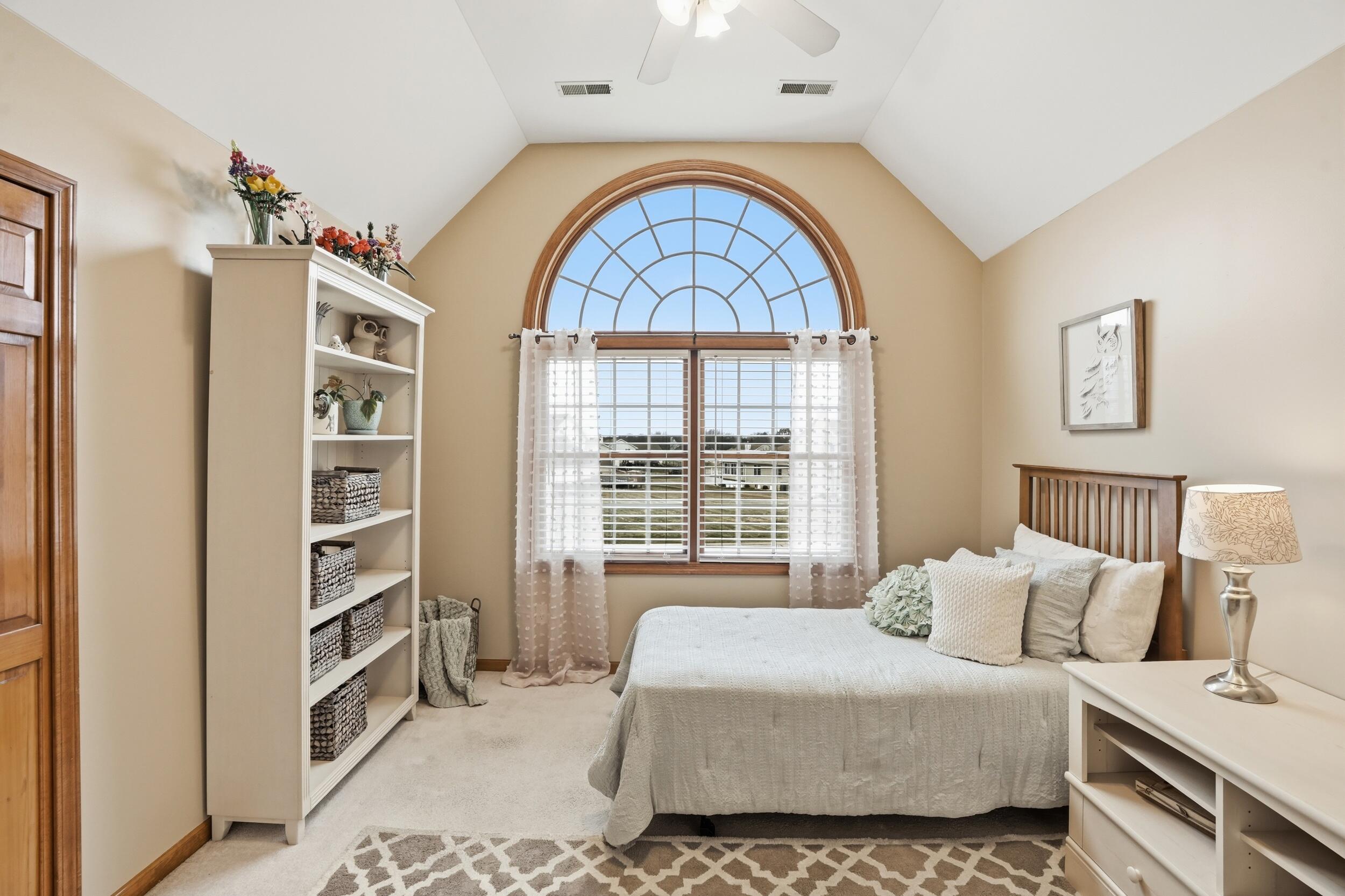 11063 Marion Place Crown Point, IN 46307 - Photo 13 of 22 a bedroom with a bed and a window
