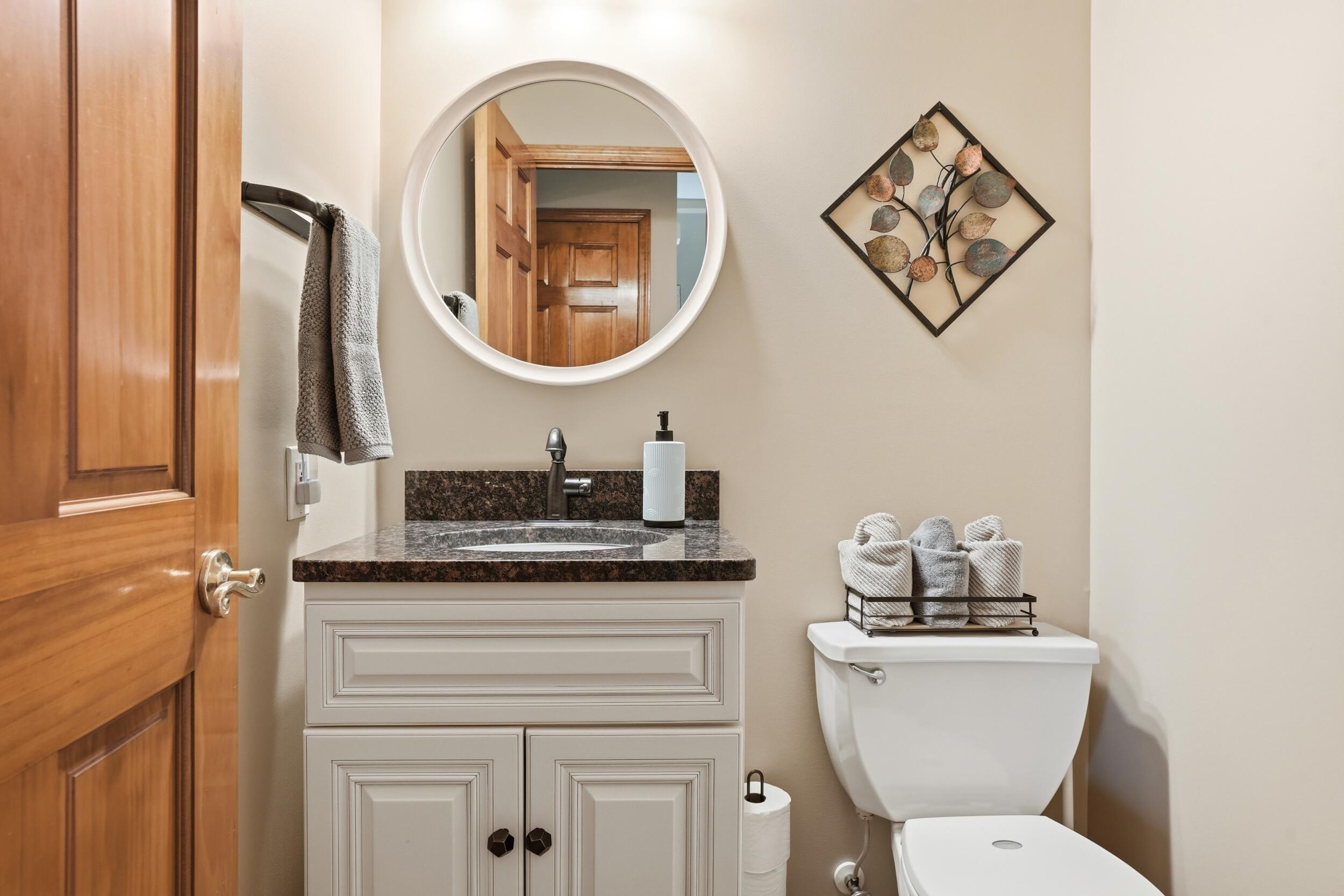 11063 Marion Place Crown Point, IN 46307 - Photo 17 of 22 a bathroom with a toilet a sink and a mirror