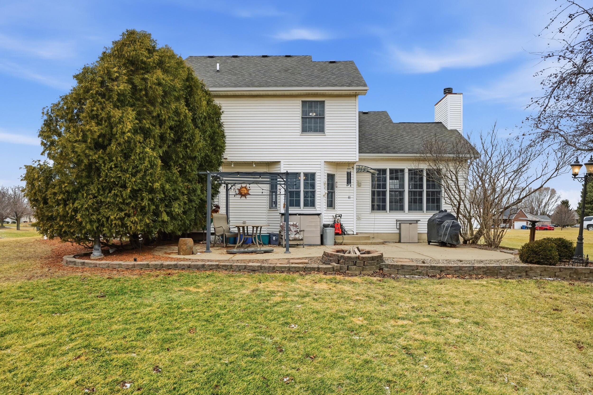 11063 Marion Place Crown Point, IN 46307 - Photo 20 of 22 a front view of a house with swimming pool