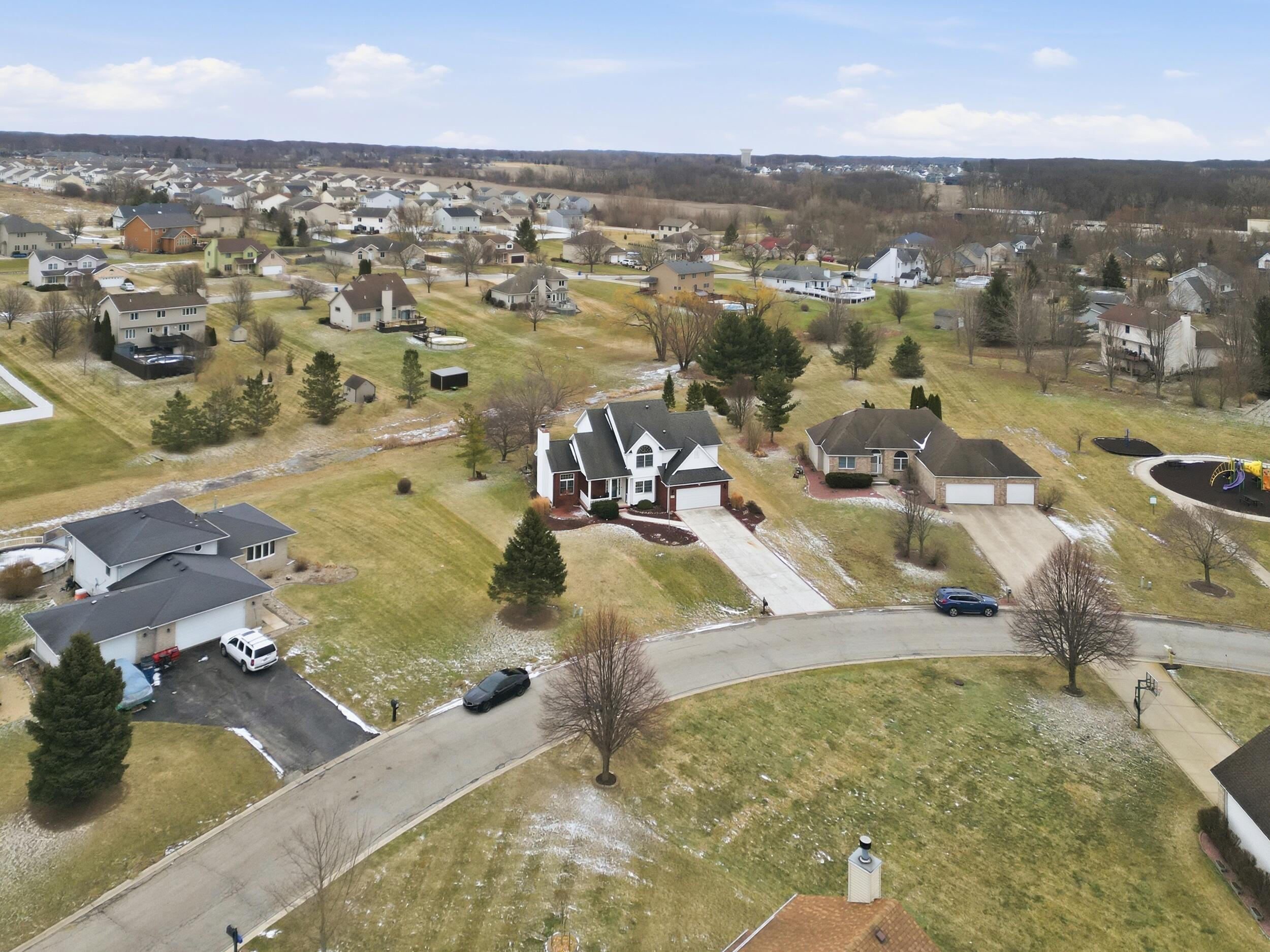 11063 Marion Place Crown Point, IN 46307 - Photo 22 of 22 an aerial view of residential houses with outdoor space