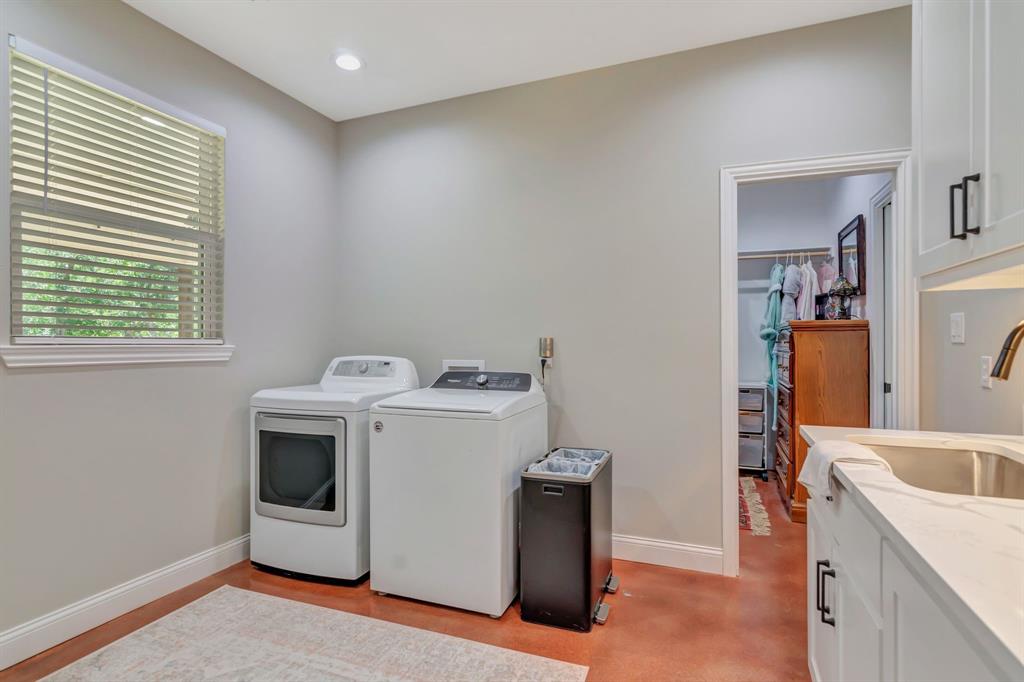 129 Whiskey Rnch Road Runaway Bay, TX 76426 - Photo 25 of 39 a utility room with dryer and washer