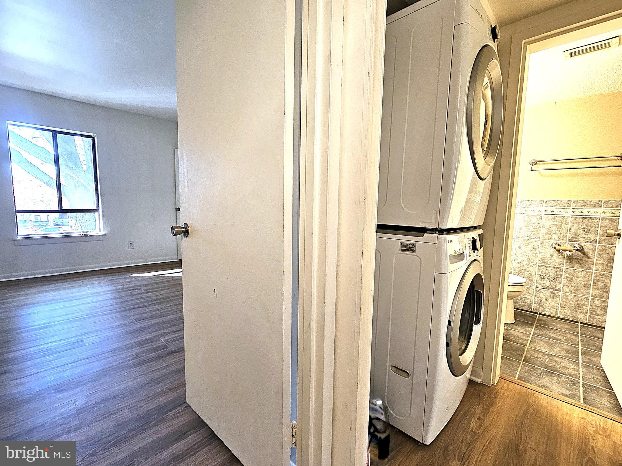 2239 Castle Rock Square, Unit 21C Reston, VA 20191 - Photo 13 of 30 a view of bathroom with washer and dryer