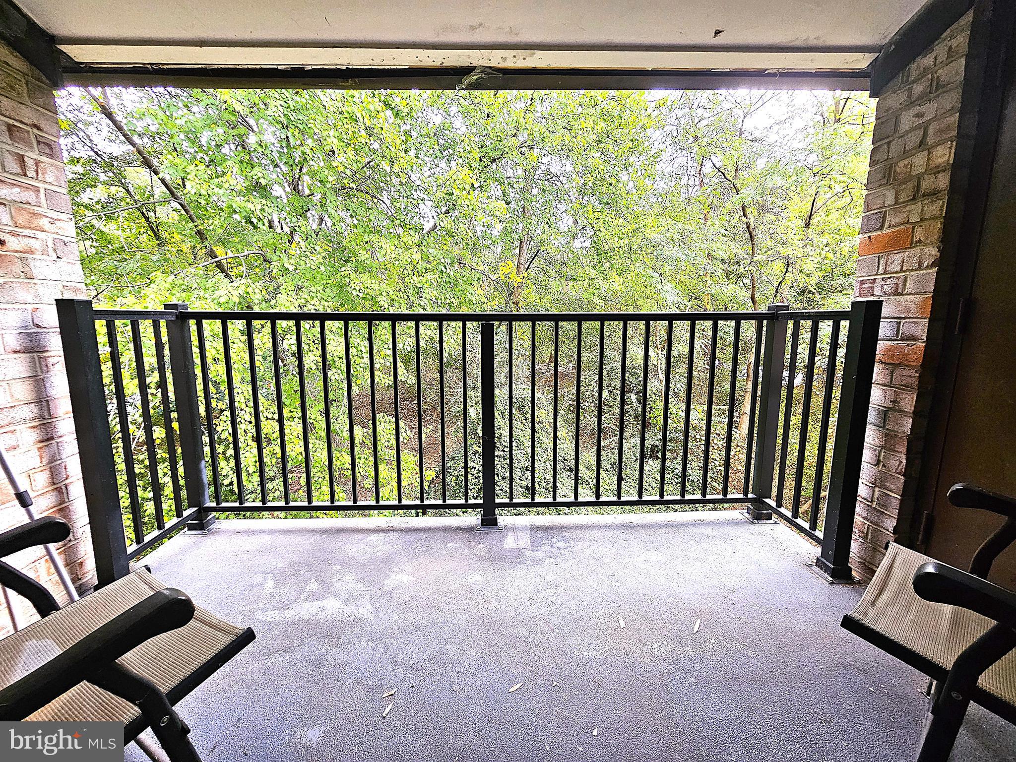 2239 Castle Rock Square, Unit 21C Reston, VA 20191 - Photo 6 of 30 a view of a large window with stairs