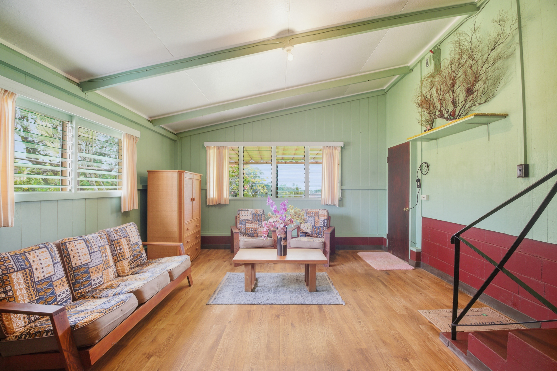 4069 Koloa Road Koloa, HI 96756 - Photo 14 of 23 a living room with furniture and a fireplace