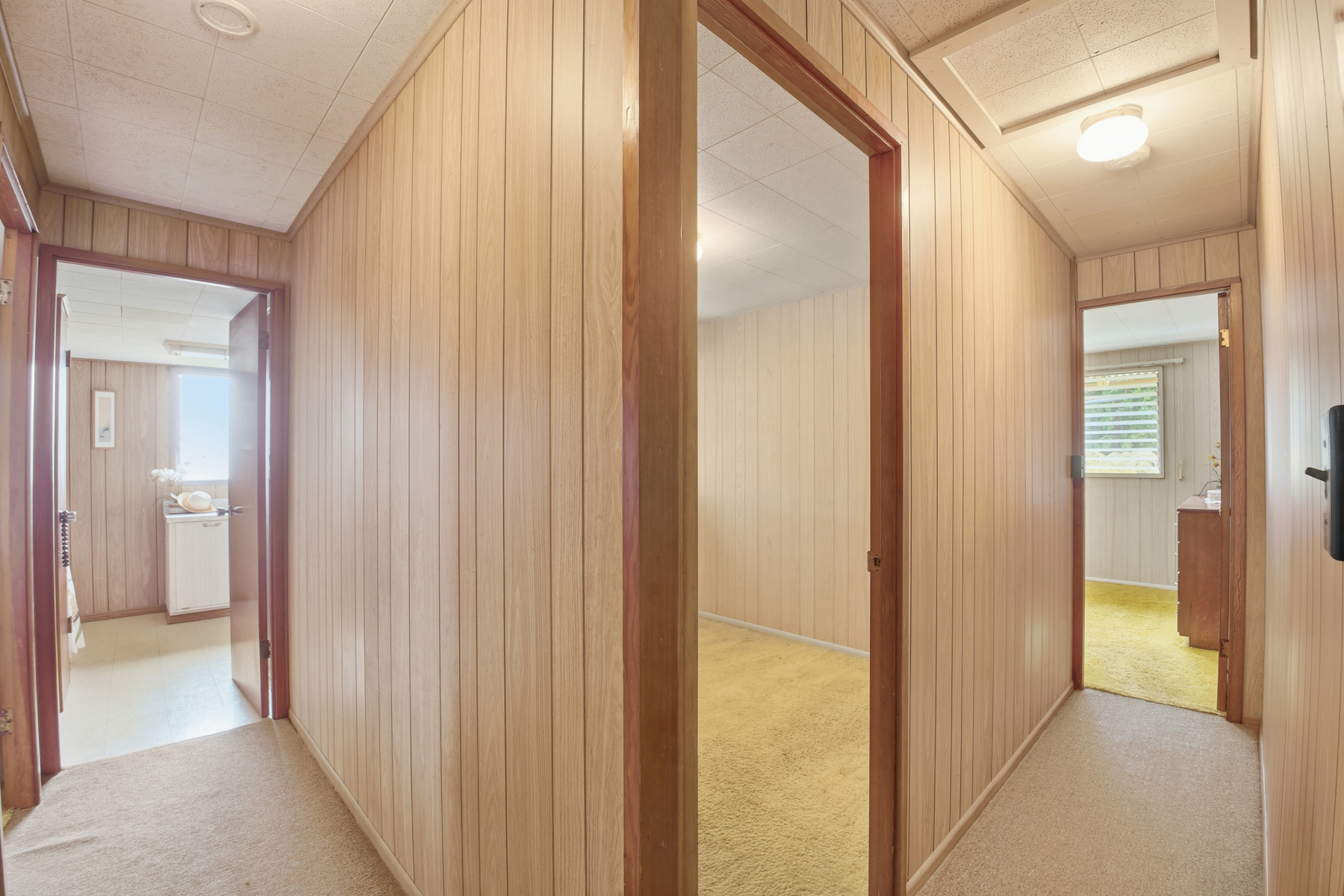 4069 Koloa Road Koloa, HI 96756 - Photo 6 of 23 a view of a hallway with bathroom and a bathroom