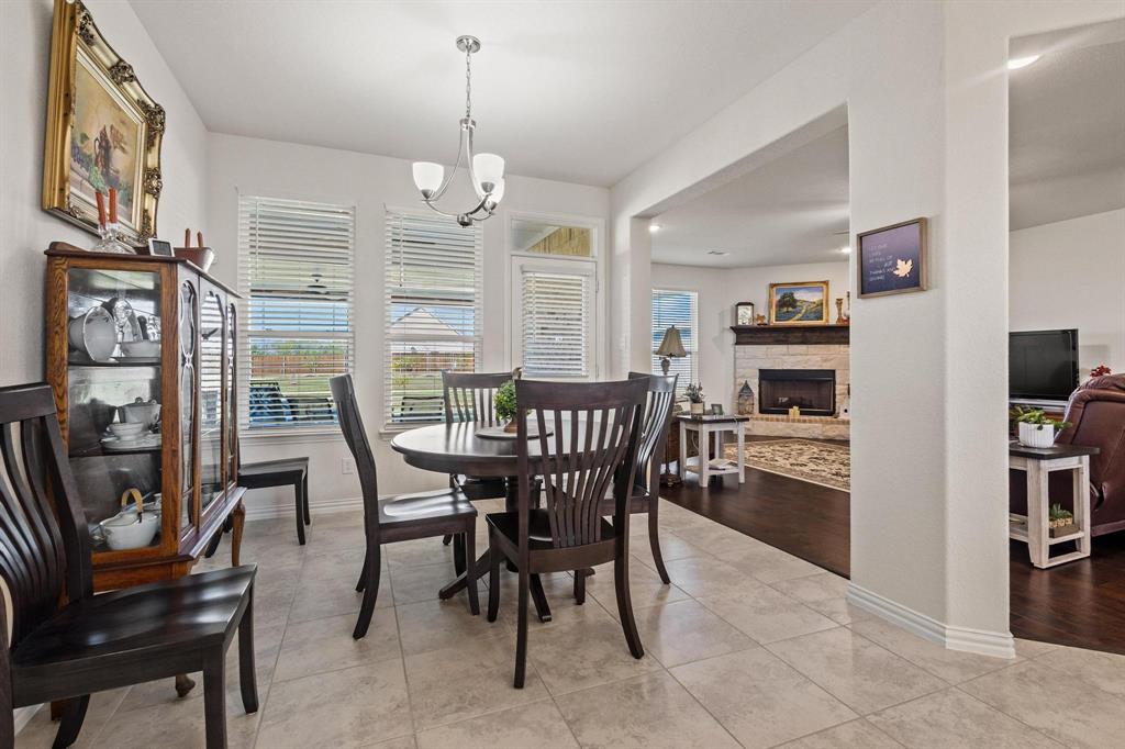 1875 Whitemound Road Sherman, TX 75090 - Photo 13 of 40 a view of a dining room with furniture window and wooden floor