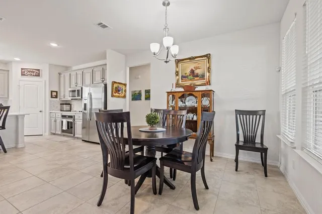 a view of a dining room with furniture