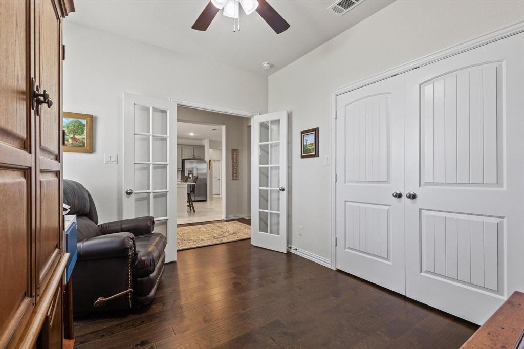 1875 Whitemound Road Sherman, TX 75090 - Photo 16 of 40 a view of a livingroom with furniture and wooden floor