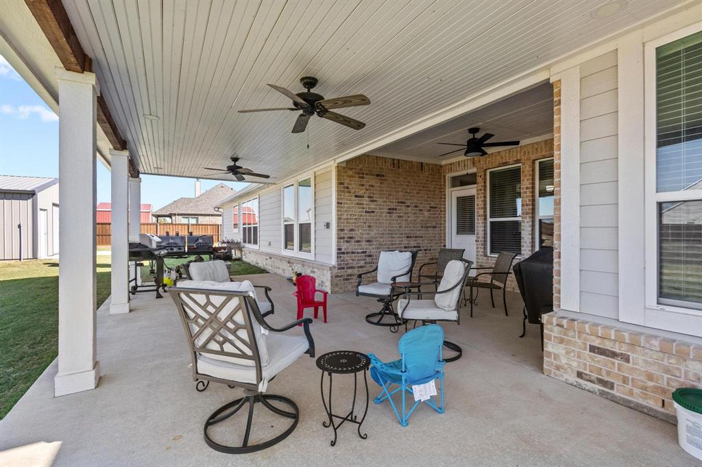 1875 Whitemound Road Sherman, TX 75090 - Photo 31 of 40 a living room with furniture and a ceiling fan