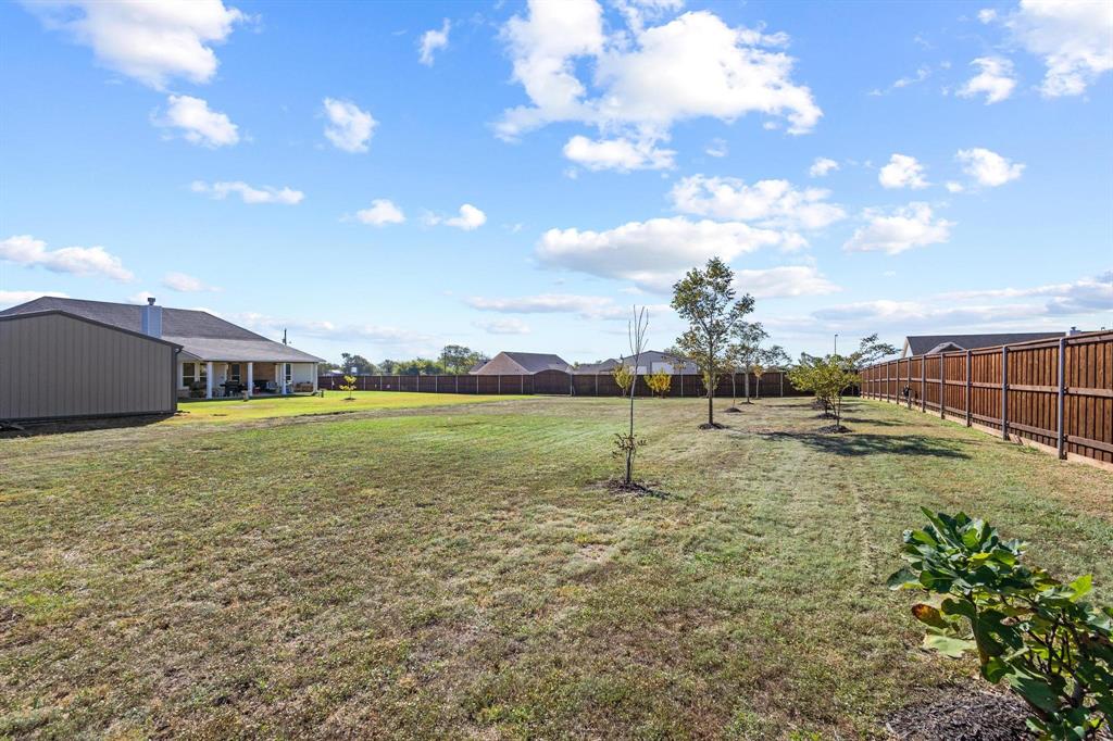1875 Whitemound Road Sherman, TX 75090 - Photo 35 of 40 a view of a house with a backyard