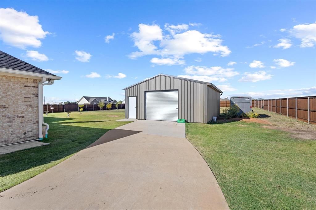 1875 Whitemound Road Sherman, TX 75090 - Photo 37 of 40 a front view of a house with garden