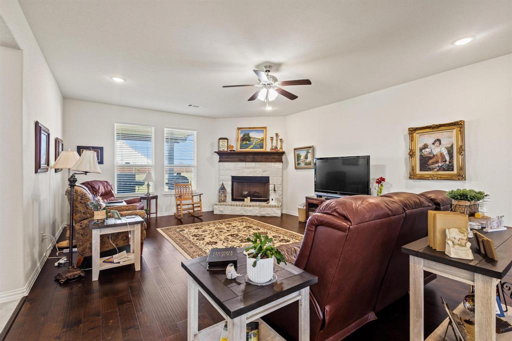 1875 Whitemound Road Sherman, TX 75090 - Photo 5 of 40 a living room with furniture fireplace and a flat screen tv