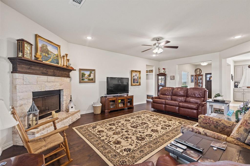 1875 Whitemound Road Sherman, TX 75090 - Photo 7 of 40 a living room with furniture and a fireplace