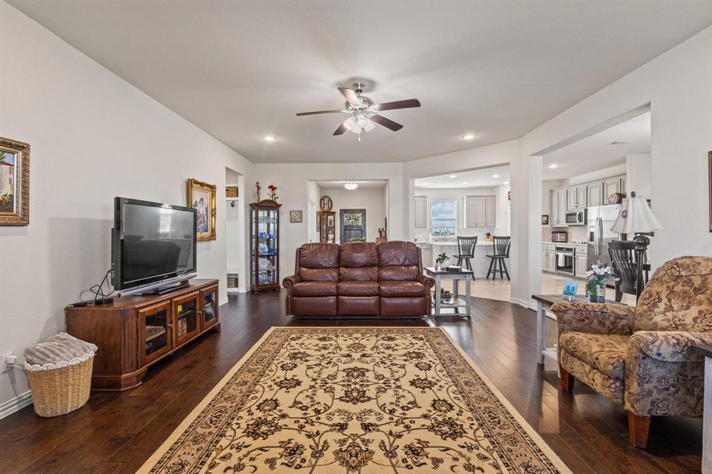 1875 Whitemound Road Sherman, TX 75090 - Photo 8 of 40 a living room with furniture and a flat screen tv