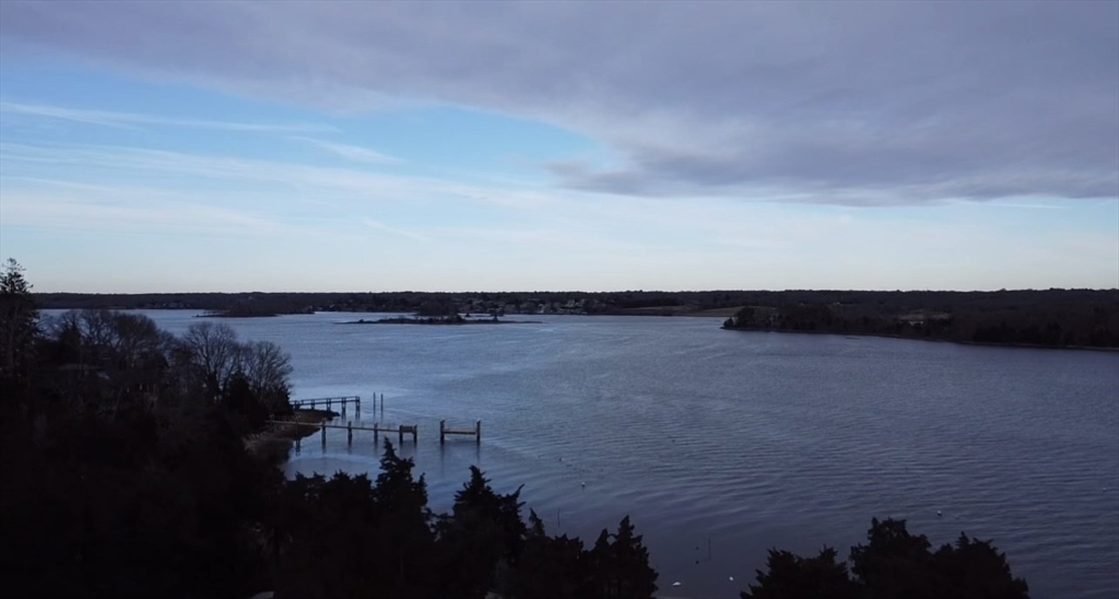 1634 Drift Road, Unit T Westport, MA 02790 - Photo 1 of 18 a view of lake and mountain