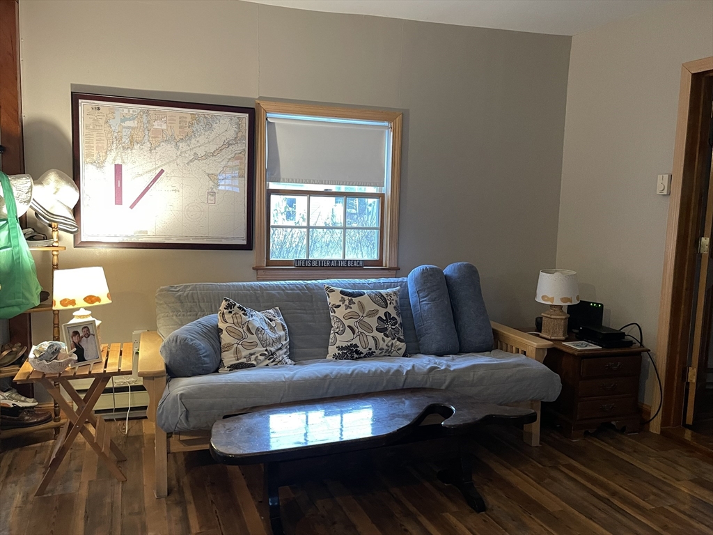 1634 Drift Road, Unit T Westport, MA 02790 - Photo 14 of 18 a living room with furniture and a flat screen tv
