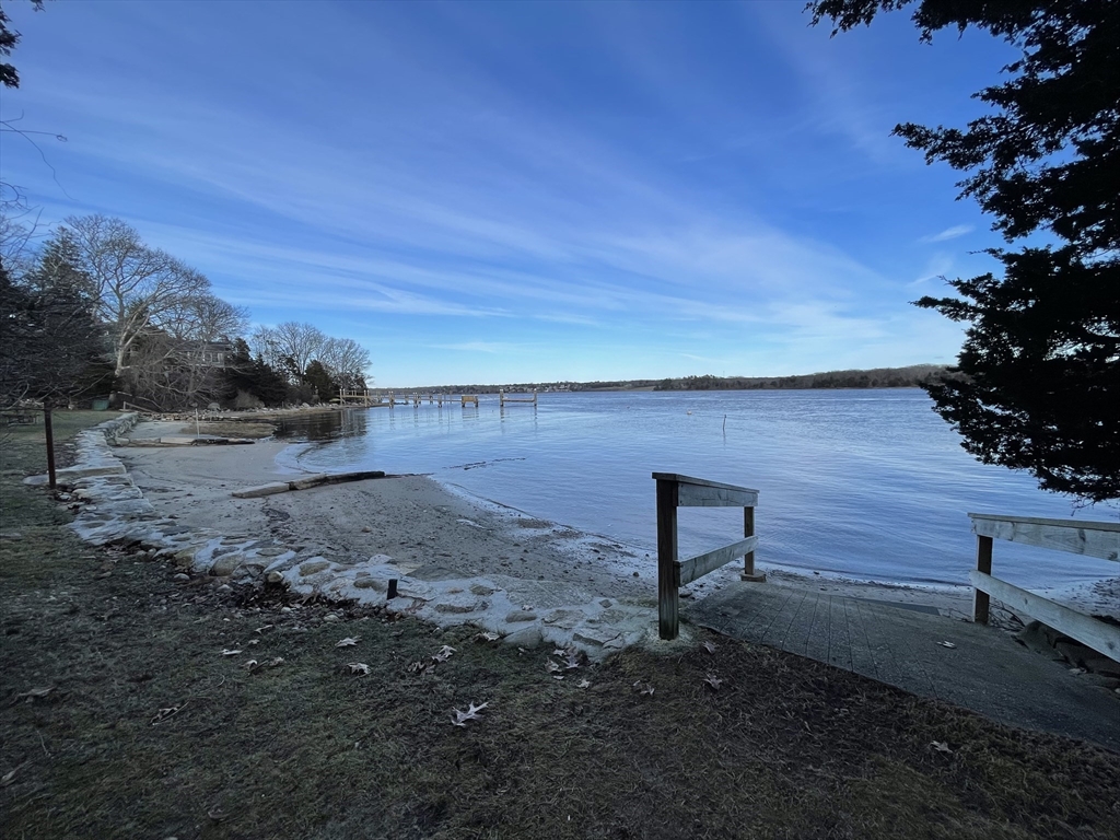 1634 Drift Road, Unit T Westport, MA 02790 - Photo 18 of 18 a view of a backyard with wooden fence
