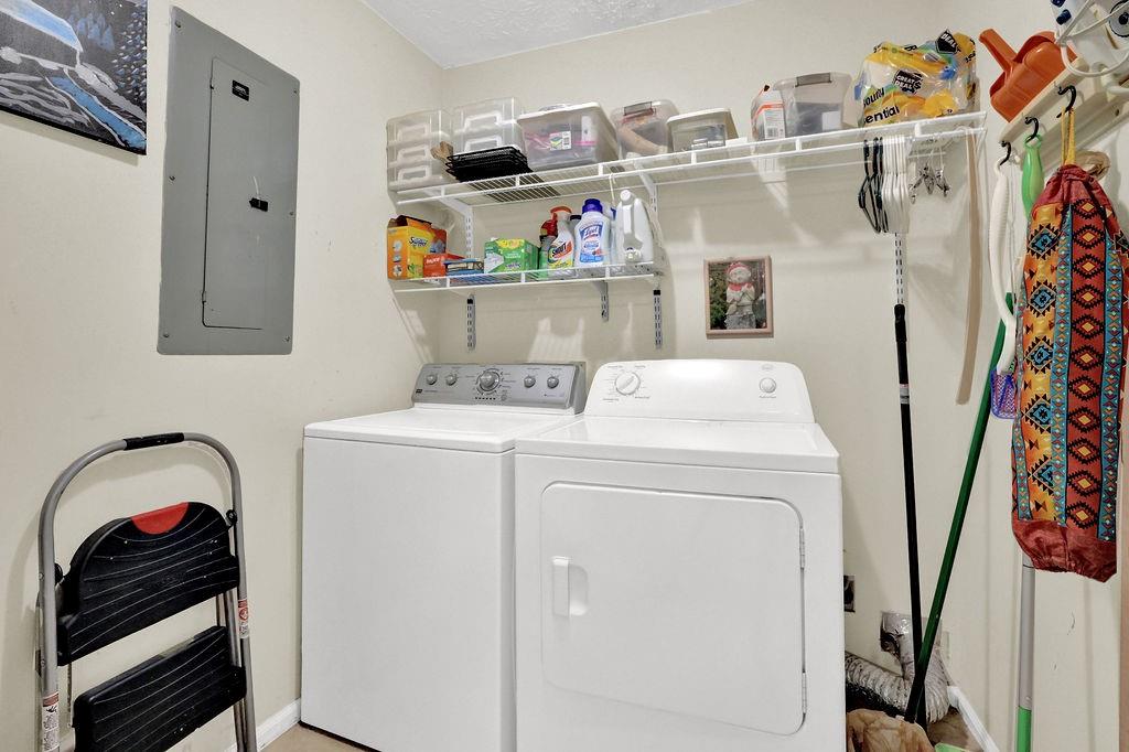 1555 Rock Springs Road Buford, GA 30519 - Photo 7 of 27 a utility room with dryer and washer