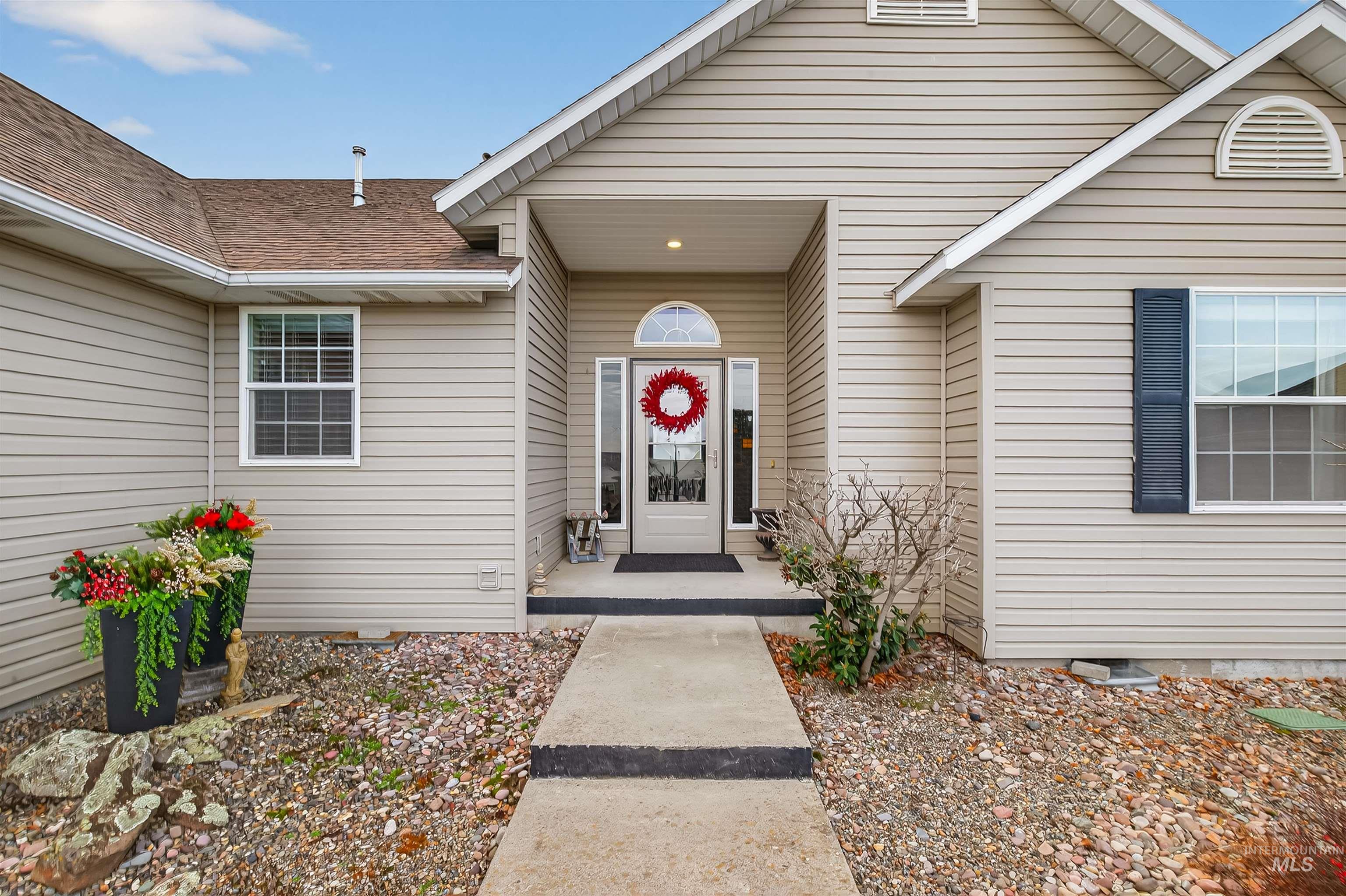 3022 Tamarack Drive Lewiston, ID 83501 - Photo 5 of 41 View of exterior entry featuring crawl space and a shingled roof