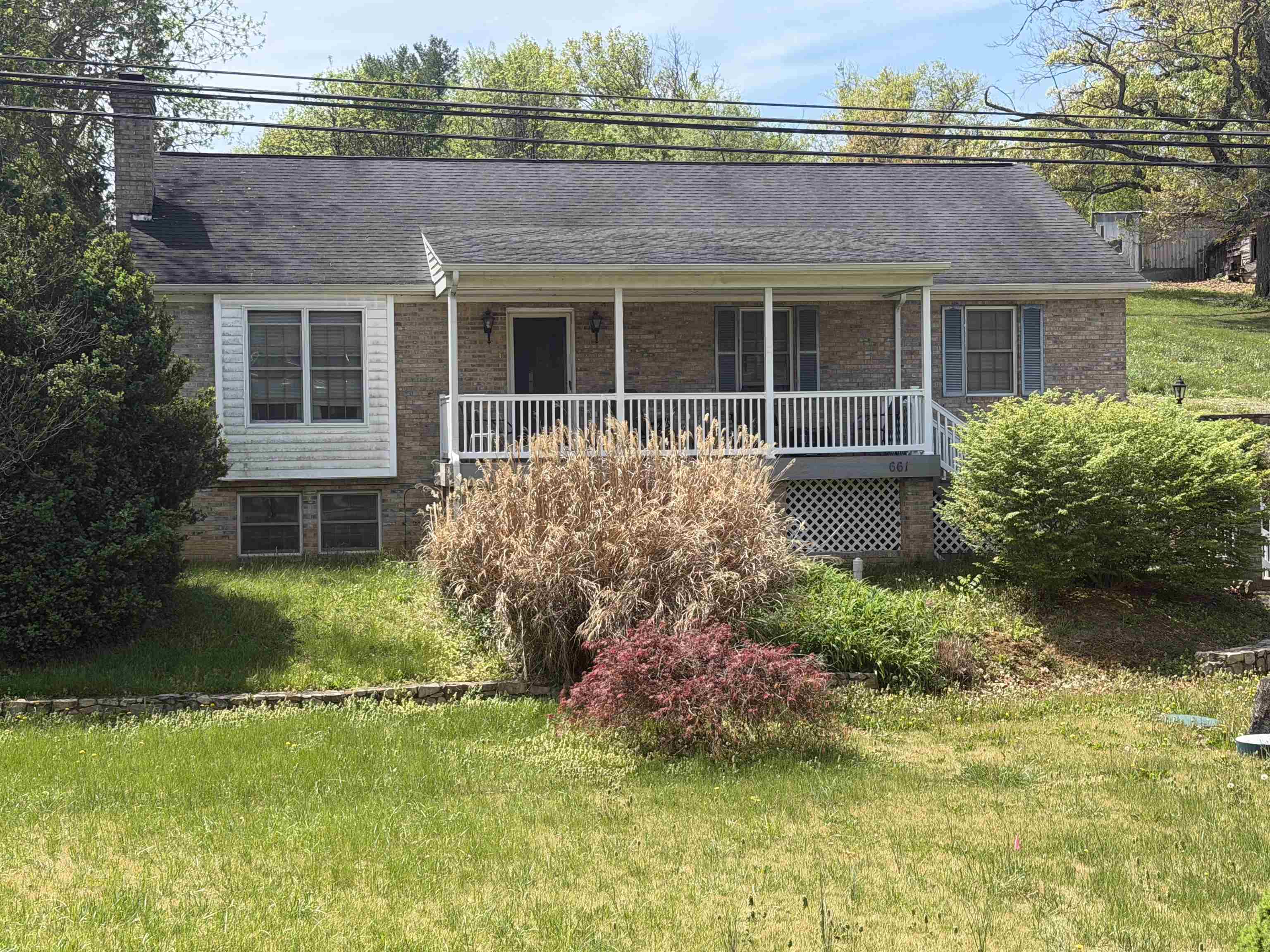 661 Ladd Road Fishersville, VA 22939 - Photo 1 of 14 a front view of a house with a yard and a fountain