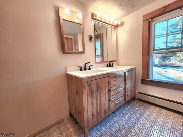 a bathroom with a shower and a toilet