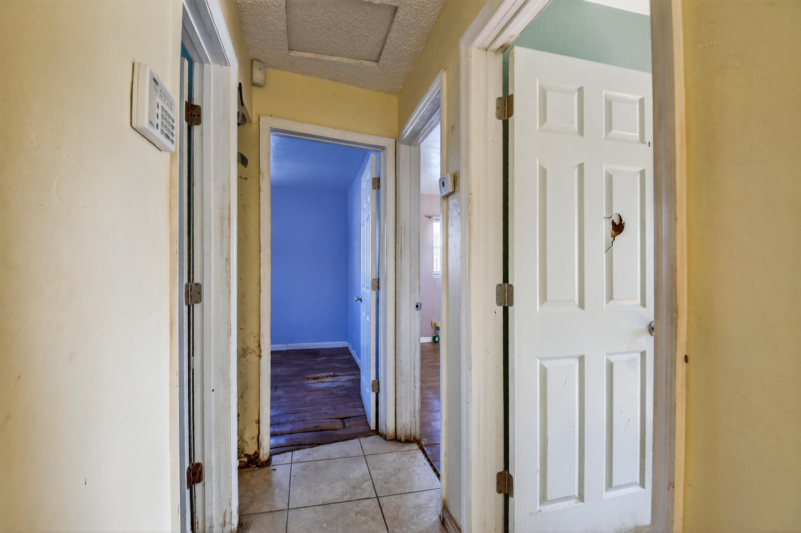 2013 Longwood Road West Palm Beach, FL 33409 - Photo 12 of 41 a view of a hallway with wooden floor