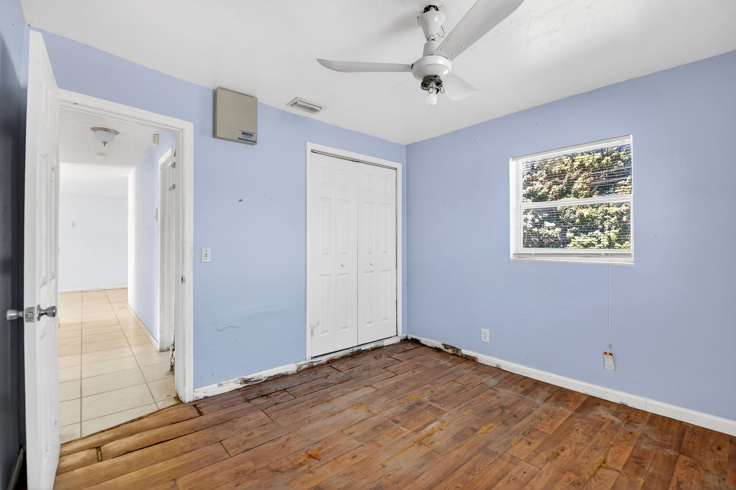 2013 Longwood Road West Palm Beach, FL 33409 - Photo 17 of 41 a view of empty room with a ceiling fan