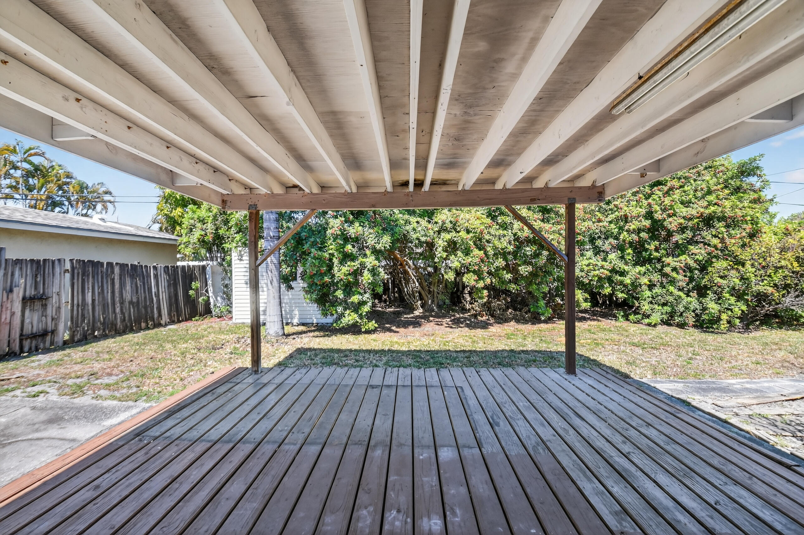 2013 Longwood Road West Palm Beach, FL 33409 - Photo 19 of 41 a view of a backyard with wooden floor