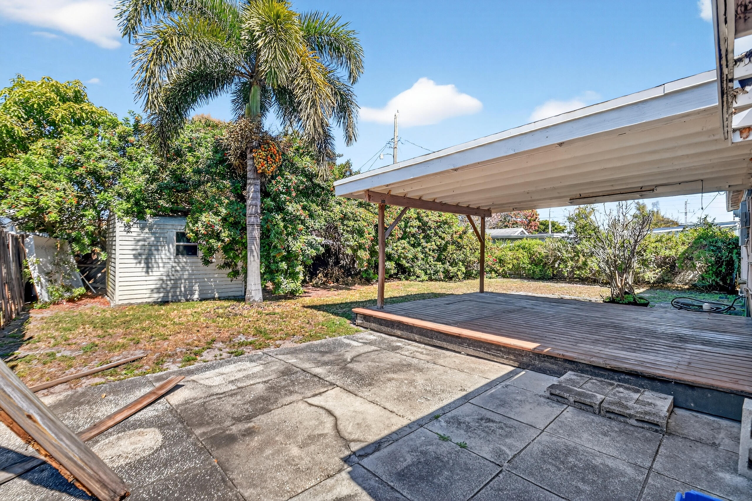 2013 Longwood Road West Palm Beach, FL 33409 - Photo 22 of 41 a view of a backyard