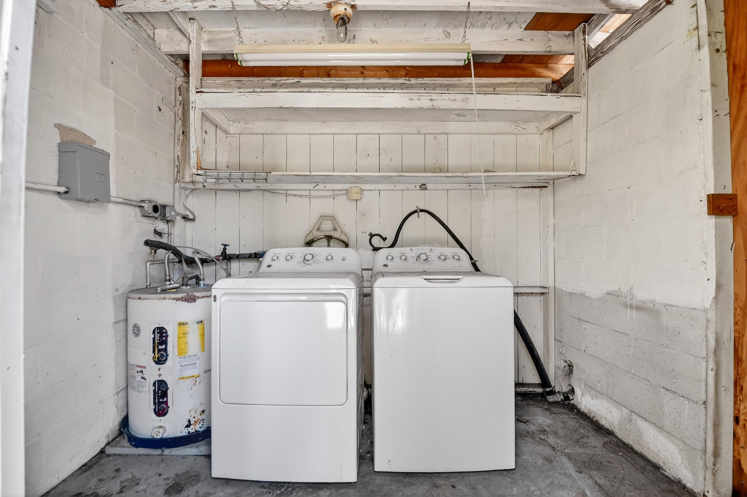 2013 Longwood Road West Palm Beach, FL 33409 - Photo 29 of 41 a utility room with dryer and washer