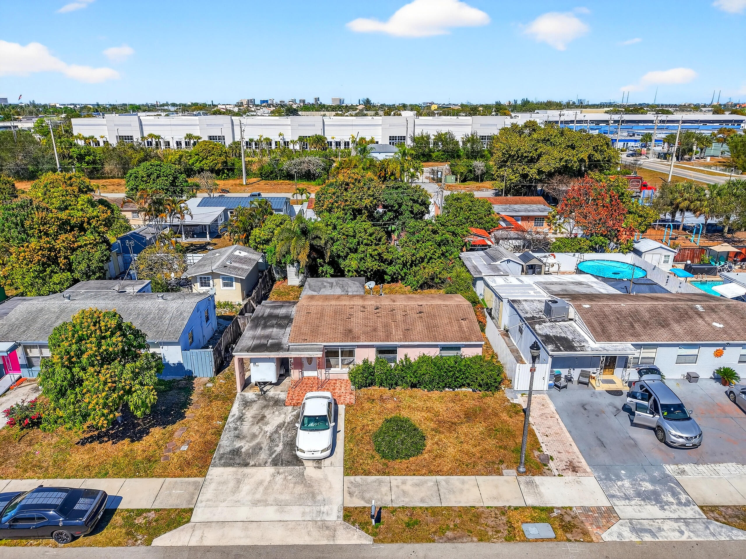 2013 Longwood Road West Palm Beach, FL 33409 - Photo 31 of 41 an aerial view of a house with lots of residential buildings ocean and mountain view in back