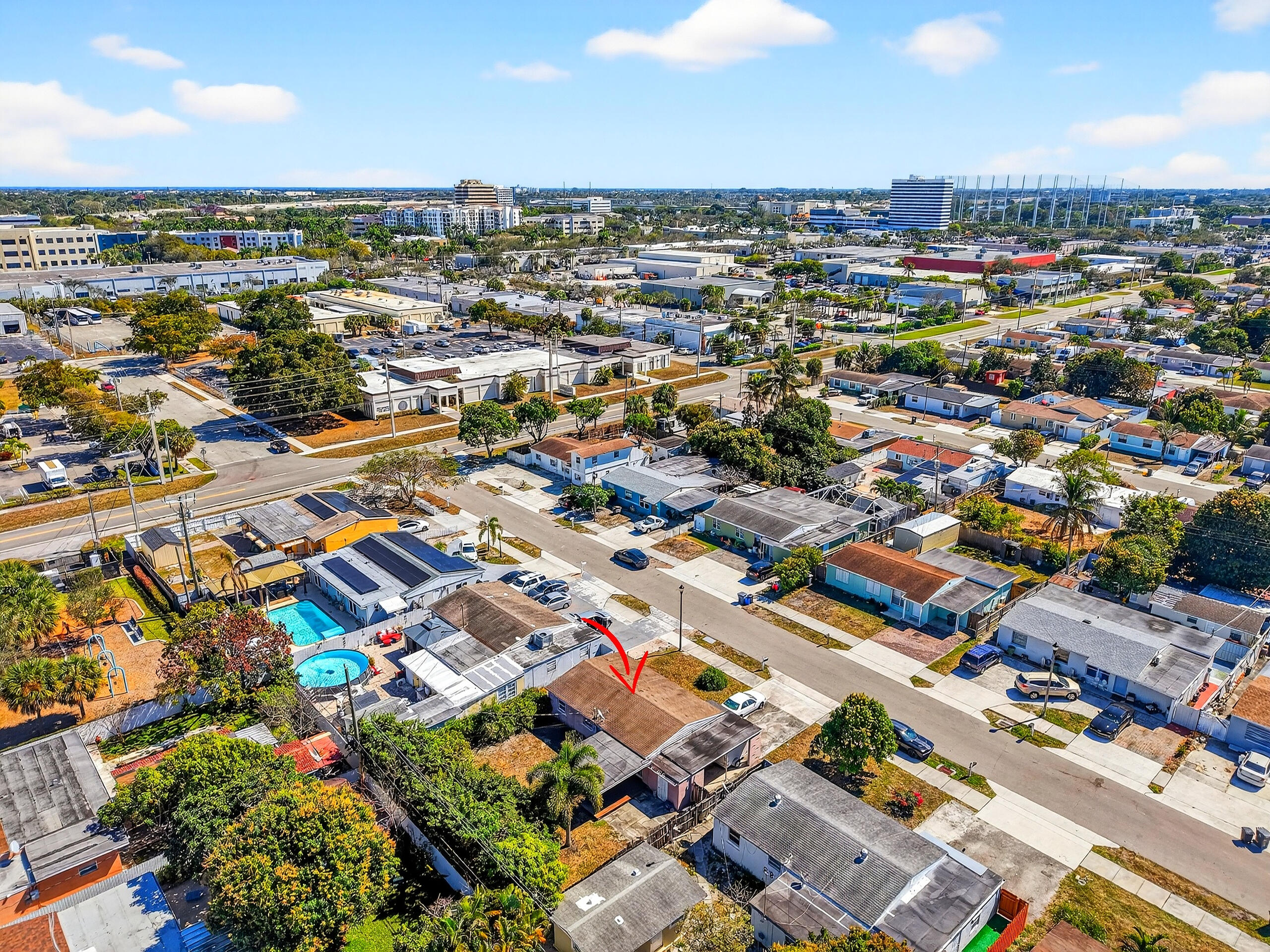 2013 Longwood Road West Palm Beach, FL 33409 - Photo 37 of 41 an aerial view of residential building with parking