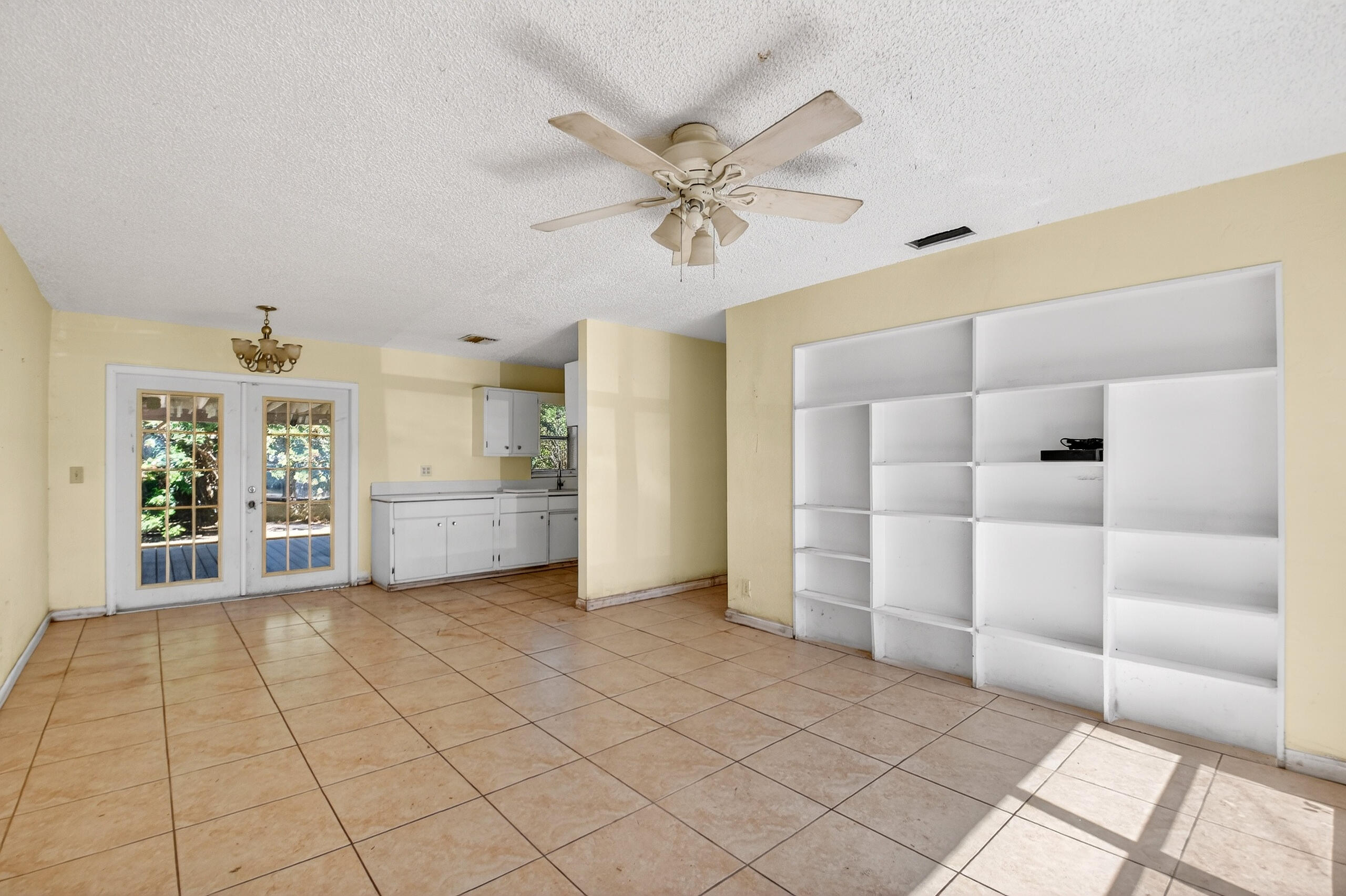 2013 Longwood Road West Palm Beach, FL 33409 - Photo 5 of 41 a view of a livingroom with a furniture and chandelier fan