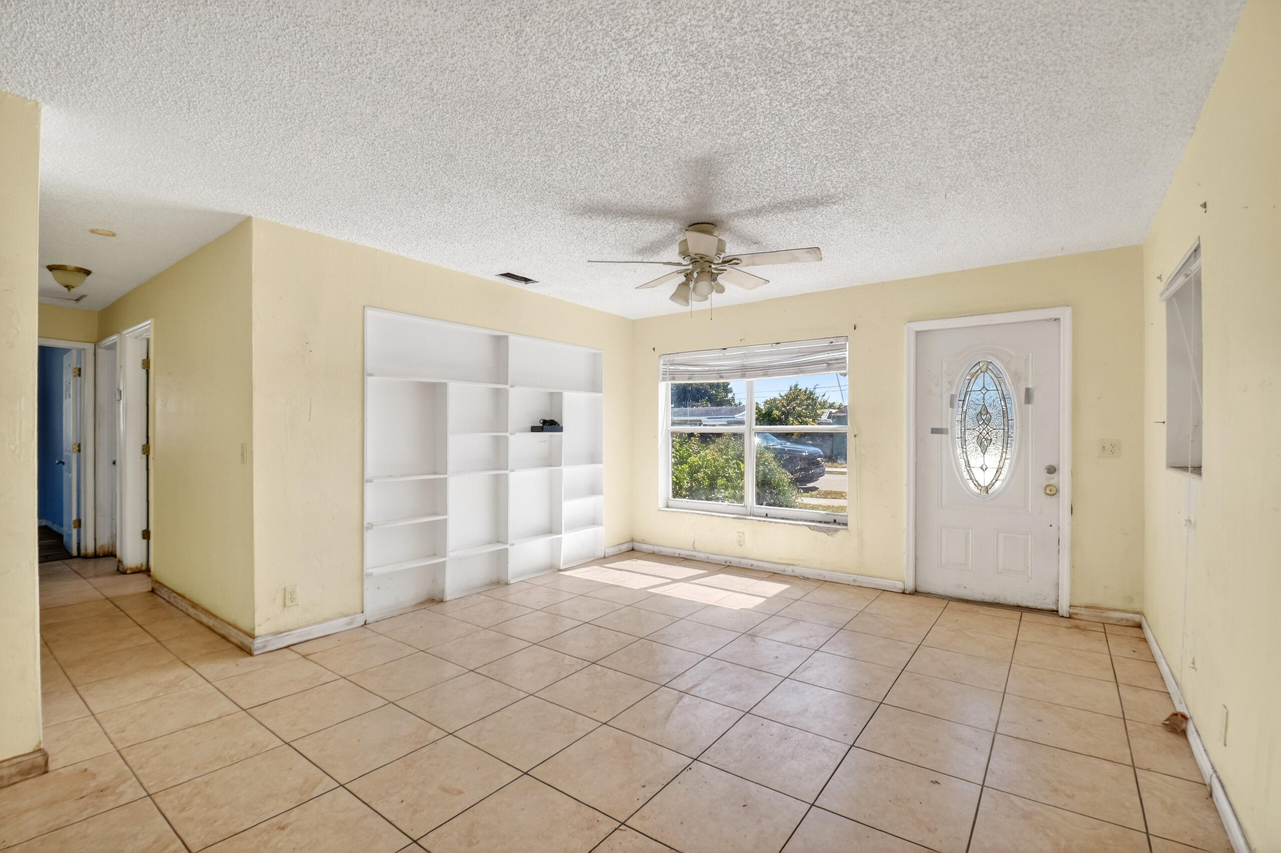 2013 Longwood Road West Palm Beach, FL 33409 - Photo 6 of 41 a view of an empty room with a window