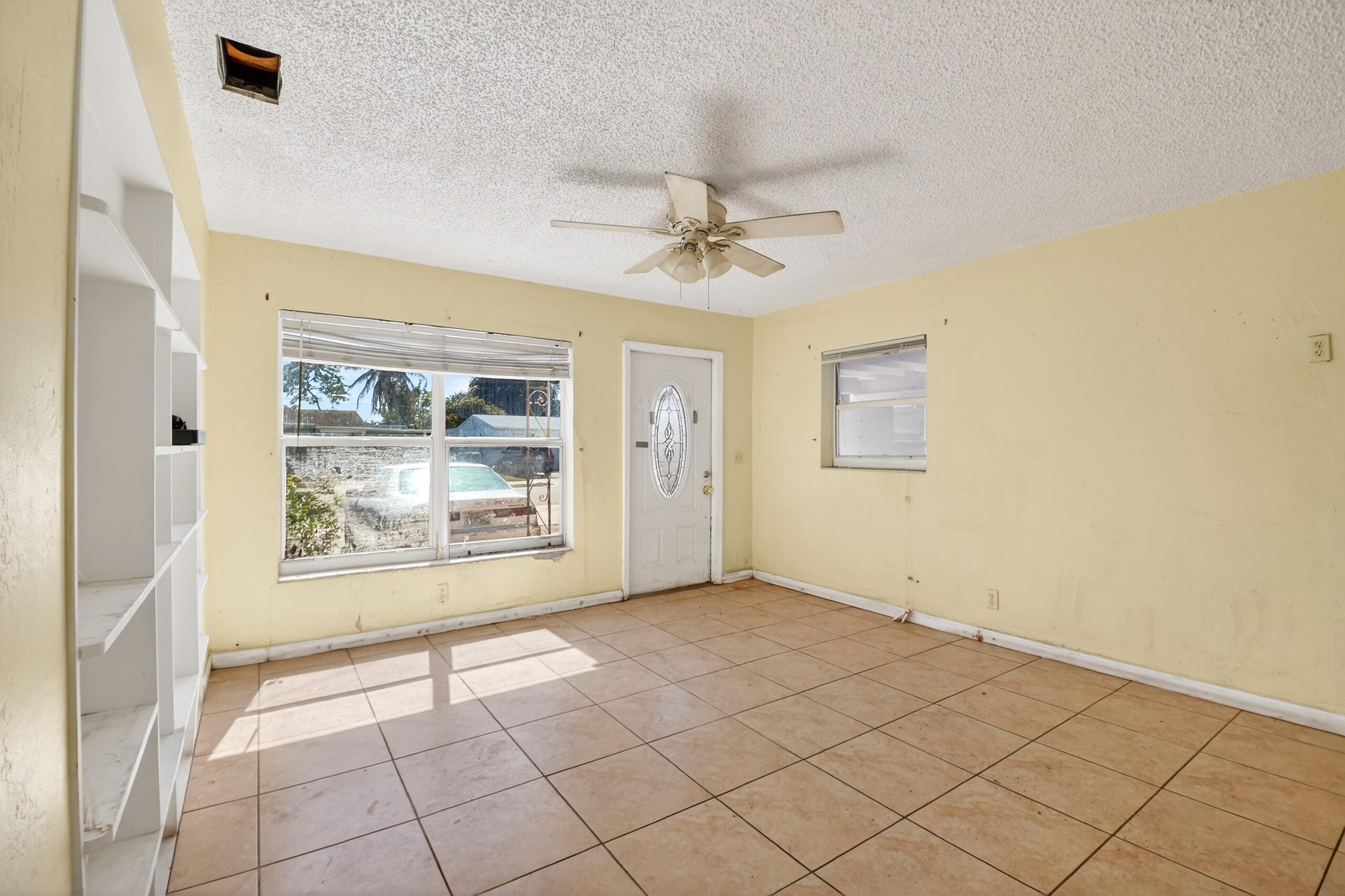 2013 Longwood Road West Palm Beach, FL 33409 - Photo 7 of 41 a view of an empty room with a window