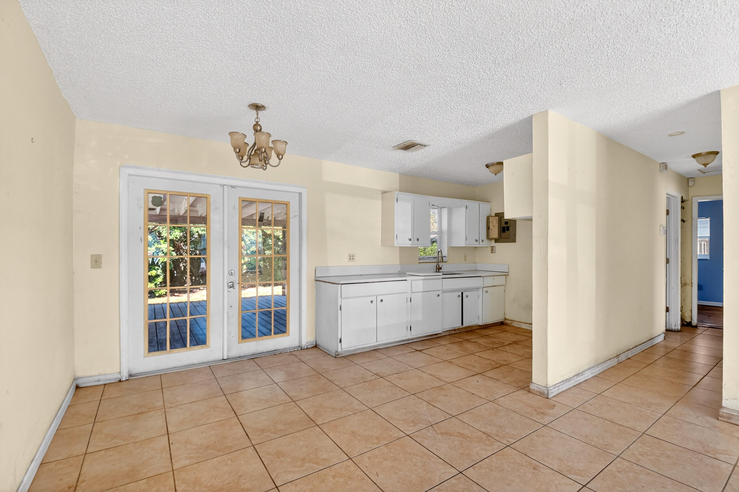 2013 Longwood Road West Palm Beach, FL 33409 - Photo 8 of 41 a kitchen with a refrigerator and a sink