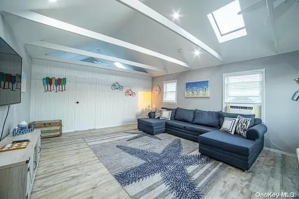 a living room with furniture and a couch