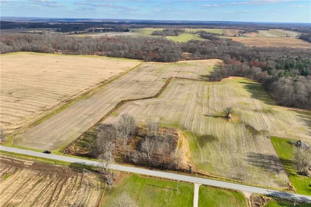 a view of a swimming pool and an outdoor space