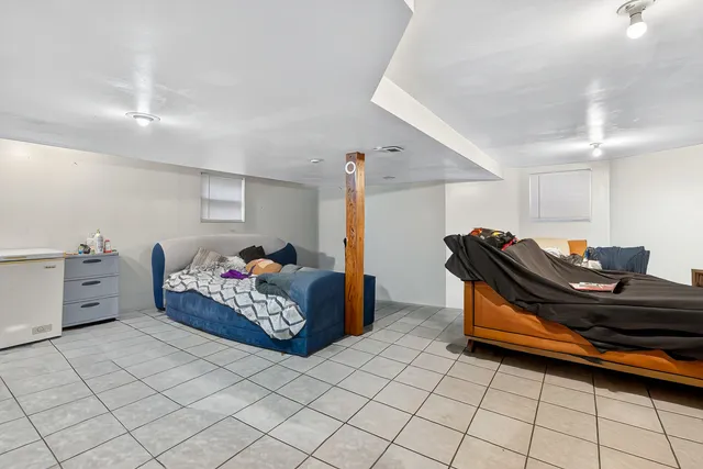 a living room with furniture and a table
