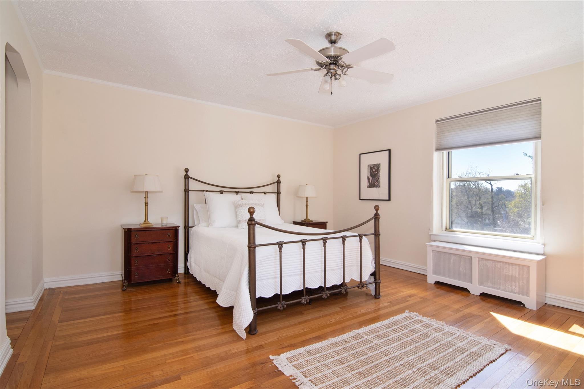 250 Bronxville Road, Unit 5A Bronxville, NY 10708 - Photo 13 of 20 a bedroom with furniture and a window