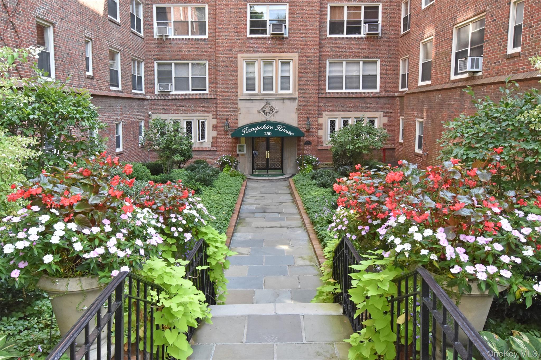 250 Bronxville Road, Unit 5A Bronxville, NY 10708 - Photo 18 of 20 a view of a pathway with flower pots