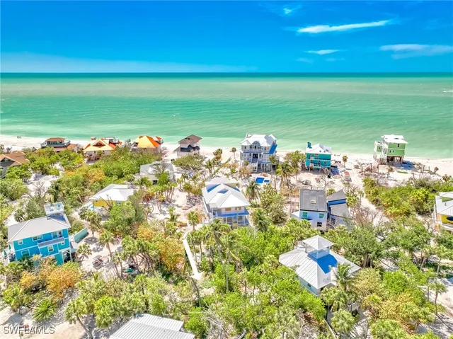 a view of a swimming pool with an outdoor space and seating area