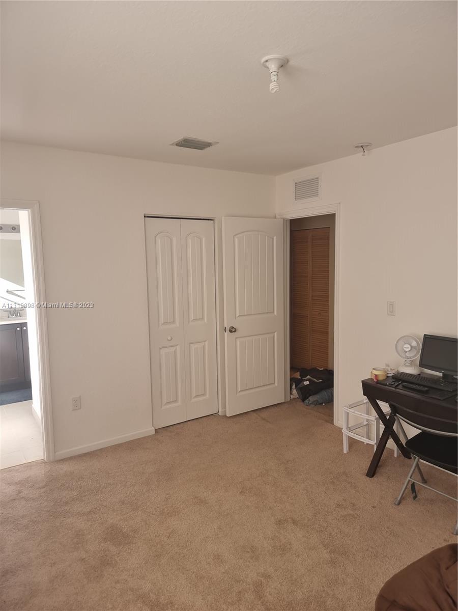 27534 Southwest 140th Avenue Homestead, FL 33032 - Photo 12 of 25 a view of an empty room