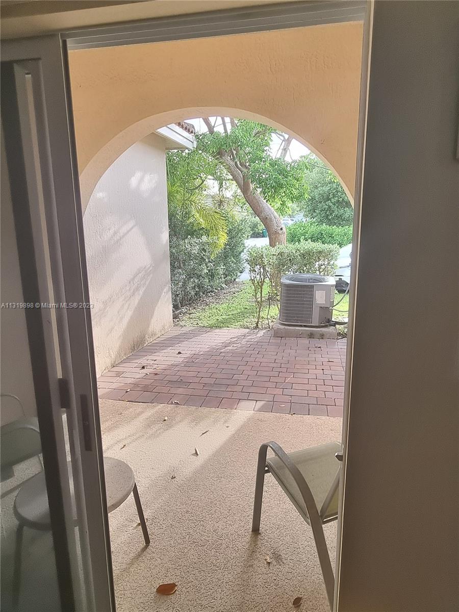 27534 Southwest 140th Avenue Homestead, FL 33032 - Photo 19 of 25 a view of balcony with wooden floor
