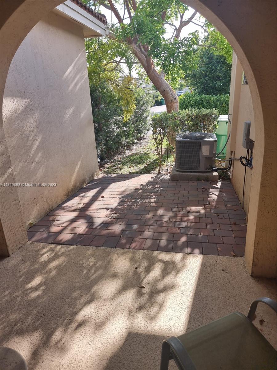 27534 Southwest 140th Avenue Homestead, FL 33032 - Photo 22 of 25 a view of backyard with outdoor seating