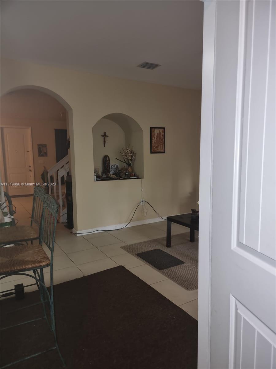 27534 Southwest 140th Avenue Homestead, FL 33032 - Photo 9 of 25 a view of workspace with wooden floor