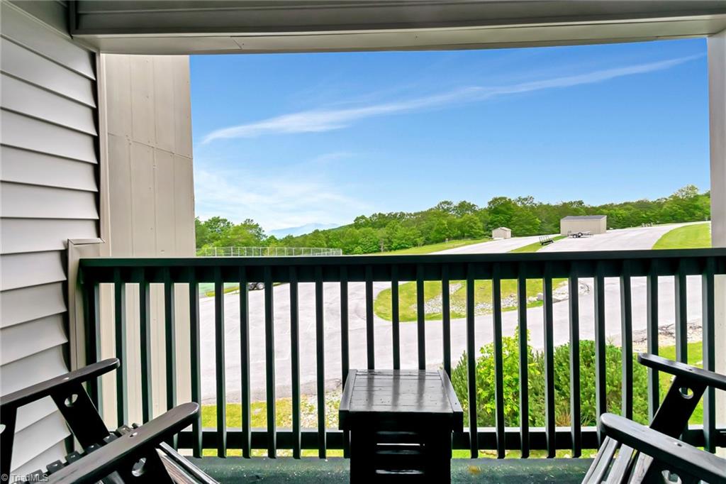 301 Pinnacle Inn Road, Unit 3230 Beech Mountain, NC 28604 - Photo 7 of 42 Covered Porch to enjoy the cool mountain air.