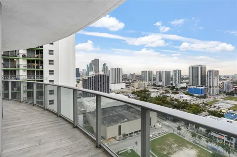 a view of a balcony with city view